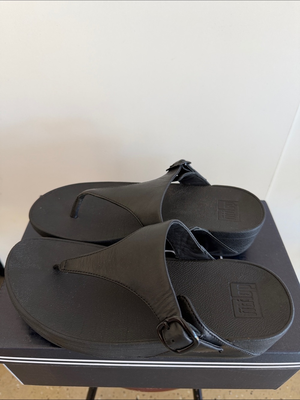 FitFlop Black Leather Slide-Toe Sandals with Buckle Accent